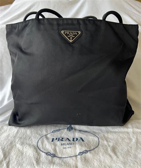 prada heart tote black.